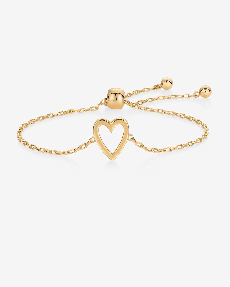 Wrap your wrist in elegance with our stunning bracelet, crafted with 14K yellow gold plating for a long-lasting finish. Enjoy peace of mind knowing it's 100% nickel-free, cadmium-free, lead-free, and hypoallergenic, making it suitable for sensitive skin. Elevate your style effortlessly with this timeless piece that adds a touch of sophistication to any ensemble.Materials: 14K Yellow Gold or Rhodium plated. Measurements: Length: 9" with an adjustable slider . Hypoallergenic; nickel, lead, and cad Solitaire Bracelet, Gold Plating, Heart Charm, Rhodium Plated, Timeless Pieces, Sensitive Skin, Gold Plate, Long Lasting, Plating