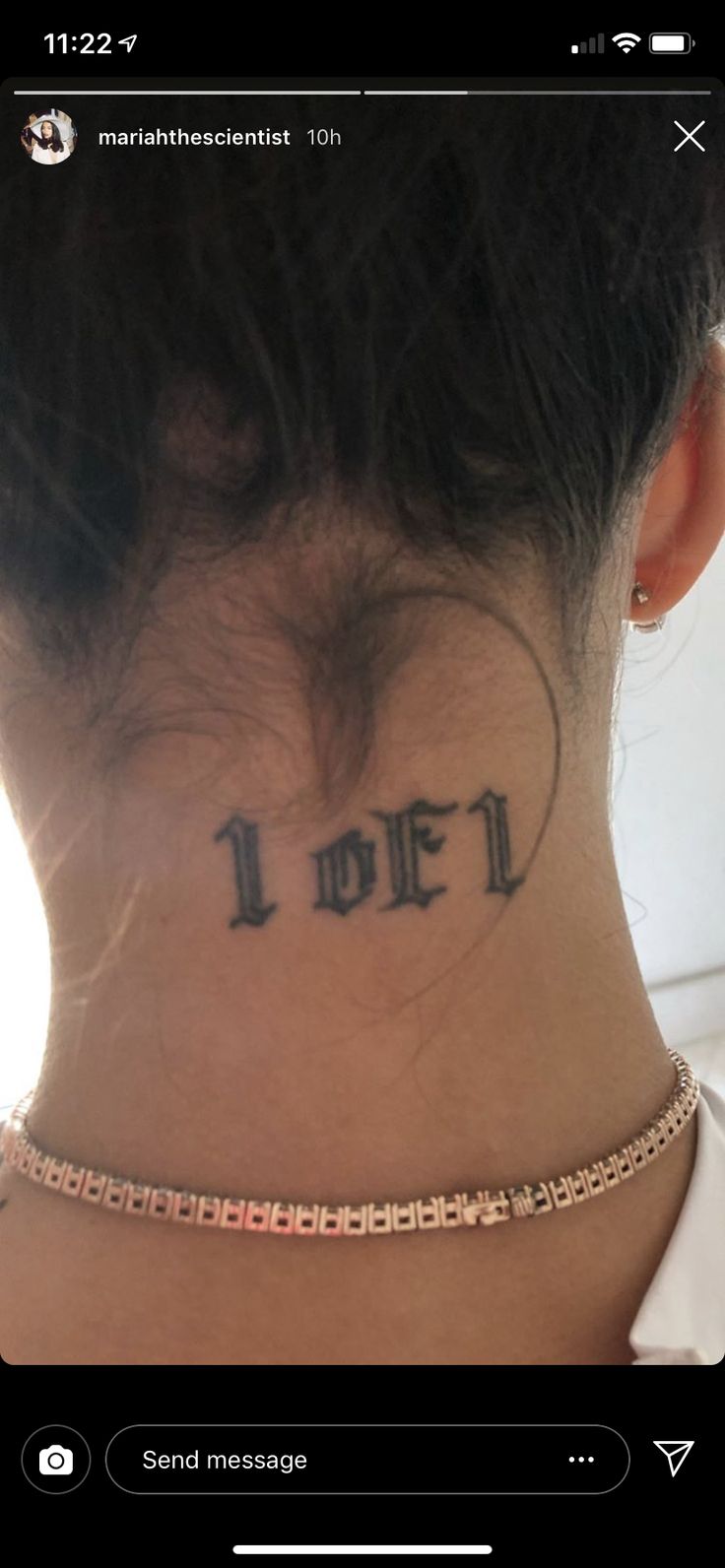 a woman's neck with the words i love you tattooed on her left side