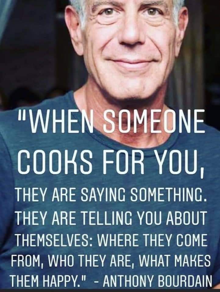 an older man with grey hair and a blue shirt is smiling in front of a quote that reads, when someone cooks for you, they are saying something