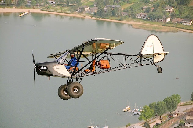 an airplane flying over a body of water