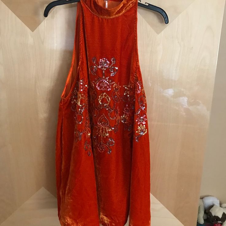 Nwot Size Small Burnt Orange Velvet Dress. Beautiful Embroidered Sequin Feature , Side Buttons On The Neck To Close Sleeveless Dress With Floral Embroidery For Festive Occasions, Festive Sleeveless Dress With Floral Embroidery, Spring Sleeveless Embellished Embroidered Dress, Spring Embellished Sleeveless Embroidered Dress, Embroidered Embellished Sleeveless Dress, Embellished Sleeveless Embroidered Dress, Sleeveless Embellished Embroidered Dress For Spring, Spring Sleeveless Sequined Embroidered Dress, Sleeveless Embroidered Sequin Dress For Party