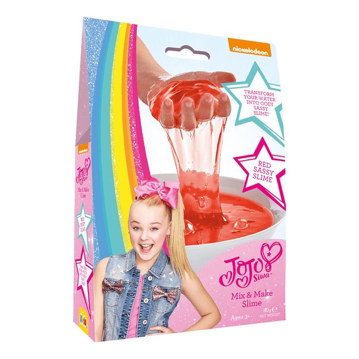 a box with a girl in it that is holding a toy blender and smiling at the camera