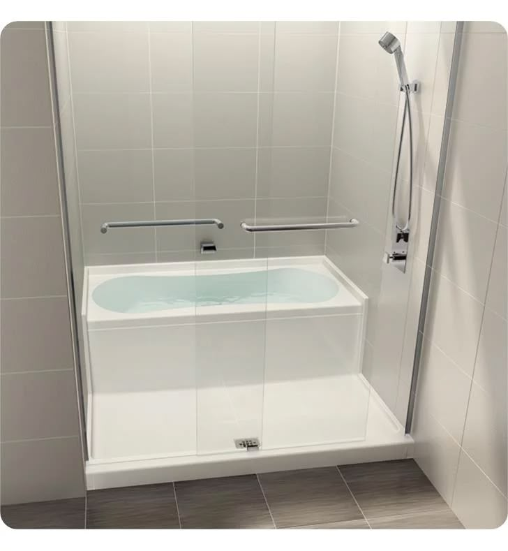 a bath tub sitting next to a walk in shower