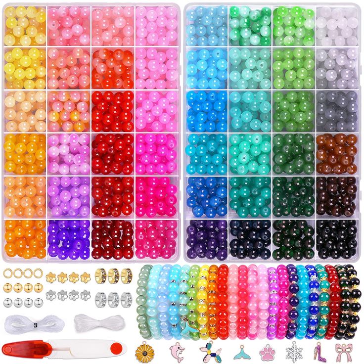 large assortment of beads and tools for making beading