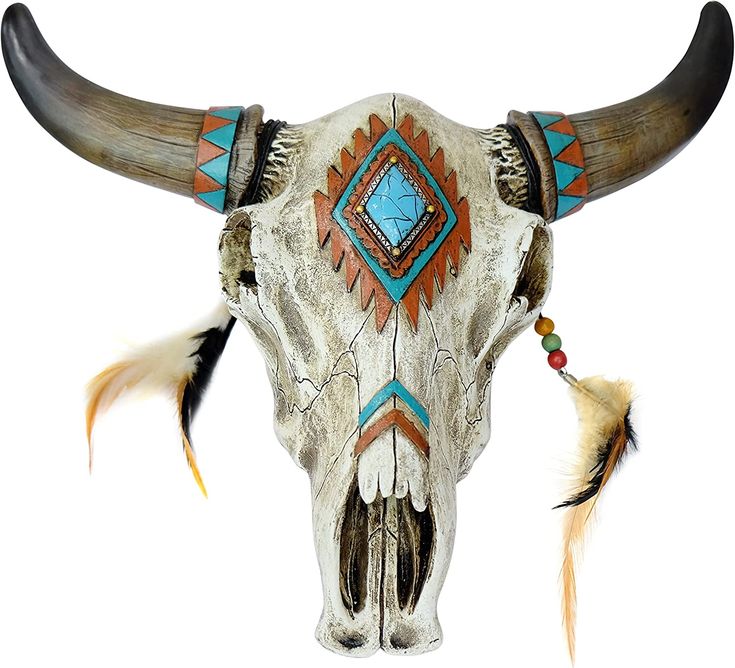 an animal skull with long horns and feathers on it's head, painted in native american style