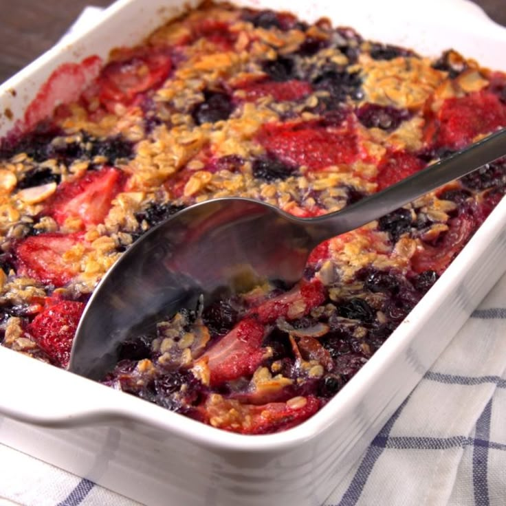 a close up of a casserole dish with fruit