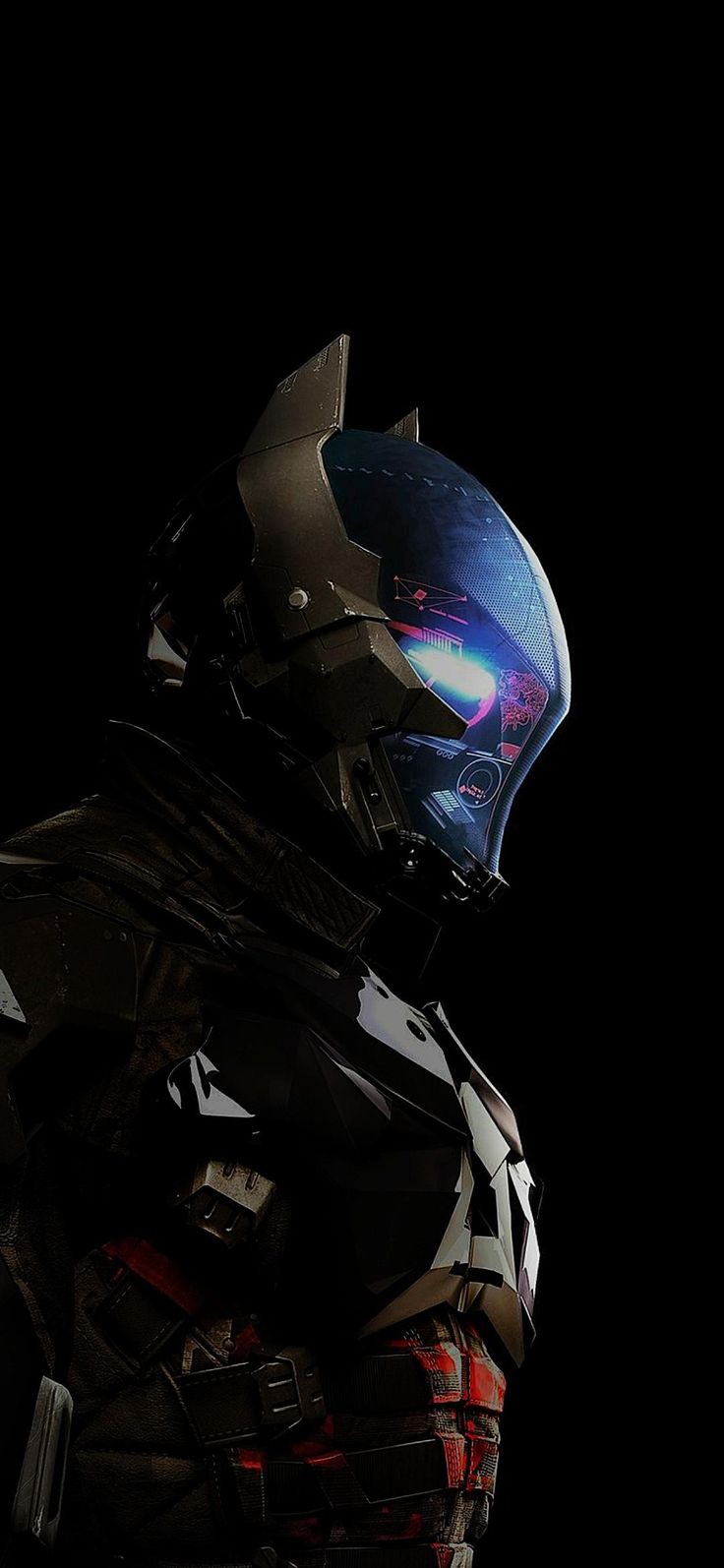 a man in a suit and helmet standing against a black background