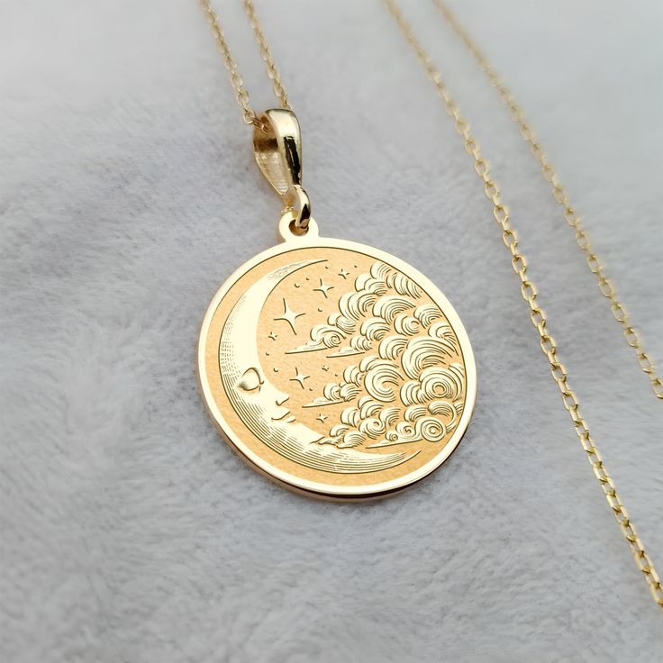 Embrace celestial elegance with this Dainty Moon Necklace, crafted from 14K solid gold for a timeless and minimalist look. This handmade necklace features a delicate moon phase pendant, symbolizing transformation and growth, accompanied by a soft cloud charm. Perfect for adding a subtle touch of cosmic charm to any outfit, this celestial necklace makes an ideal gift for her. ⚜️ Package included: One Handmade Necklace - Made to order ⚜️ Colors: Silver / Gold / Rose Gold ⚜️ Materials: 925 Sterling 14k Gold Celestial Moon Phase Necklace, Fine Jewelry Moon Phase Necklace In 14k Gold, Fine Jewelry 14k Gold Moon Phase Necklace, 14k Gold Moon Phase Necklace, Dainty Yellow Gold Necklace With Sun And Moon Design, 14k White Gold Moon Phase Necklace, Elegant Yellow Gold Necklaces With Sun And Moon Design, 14k Yellow Gold Moon Necklace, Elegant Yellow Gold Sun And Moon Necklaces