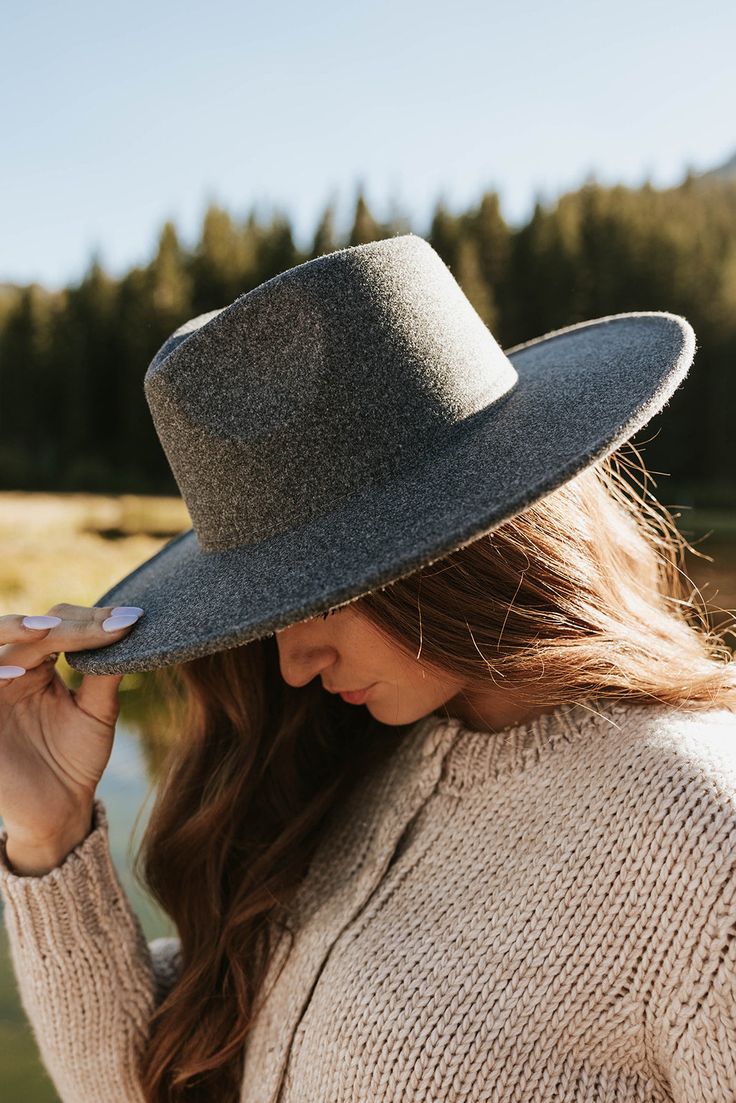 THIS SALE ITEM IS FINAL SALE! Every mom uniform checklist HAS to include the Sierra Hat. This charcoal-colored felt hat comes with a flat wide brim, and a comfortable crown. This color is neutral and we can't think of any outfit this hat will not go well with. Sierra Hat-Charcoal, boutique clothing, casual, the perfect hat! Boutique Clothing Casual Wide Brim Boater Hat For Winter, Winter Casual Wide Brim Boater Hat, Casual Winter Wide Brim Boater Hat, Solid Color Winter Hat With Flat Crown, Solid Flat Crown Hat For Winter, Winter Solid Color Flat Crown Hat, Solid Color Flat Crown Hat For Winter, Casual Short Brim Boater Hat For Fall, Winter Boater Hat With Curved Brim, One Size