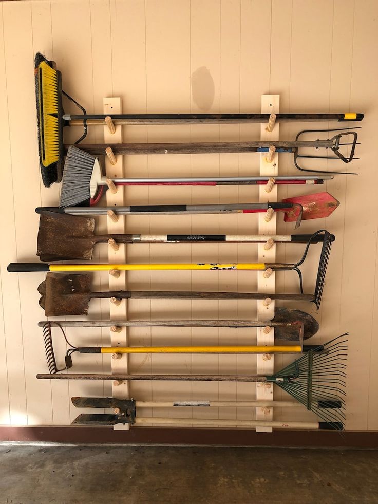 there are many different types of skis hanging on the wall