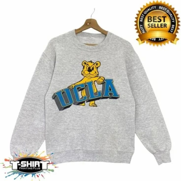 Vintage Ncaa Ucla Bruins Shirt, University Of California Los Angeles Shirt For Men Women, College Sweatshirt Mrry Our Classic T-Shirt Serves As The Perfect Short-Sleeved Shirt For Your Unique, Funny, Or Personalized Designs. Brand: Gildan Heavy Weight Fabric Classic Unisex Makes This An Easy Fit Size Up If You Want Something Roomier Our Shirts Materials: 100% Cotton ** Note: - Double Check Your Address Before Ordering. - If You Want To Return The Goods, You Are The One To Pay The Shipping Fee, W Vintage School Shirts, College Merch Ideas, Vintage College Shirts, School Tshirt Designs, Ucla Sweatshirt, Los Angeles Sweatshirt, Vintage College Sweatshirts, Swag Shirts, College Merch