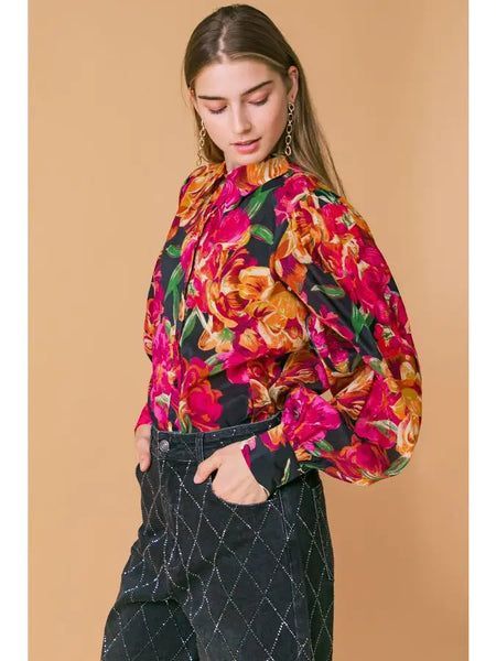 This beautiful floral puff sleeve blouse is the perfect addition to your wardrobe. Featuring a classic collared blouse design with button closures and premium quality puff sleeves, this piece is sure to be your next go-to item. Its multicolored floral pattern stands out, while its versatile design means that you can wear it for almost any occasion. Collared Blouse, Cuff Detail, Puff Sleeve Blouse, Woven Top, Blouse Design, Shirt Collar, Floral Blouse, Puff Sleeves, Blouse Designs