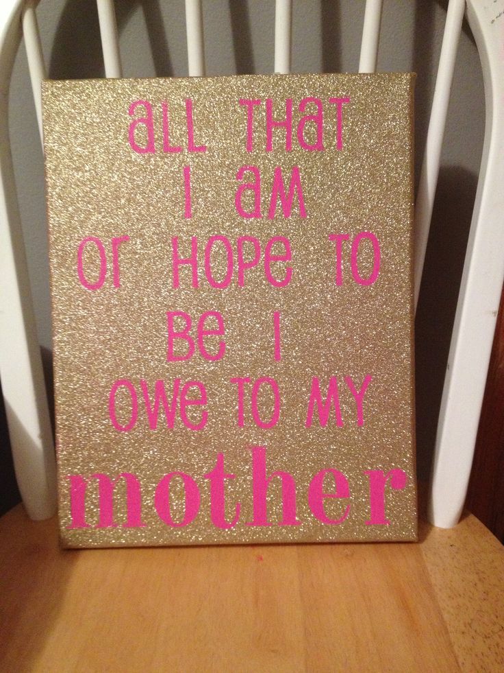 a gold and pink sign that says, all that i am or should be my own mother