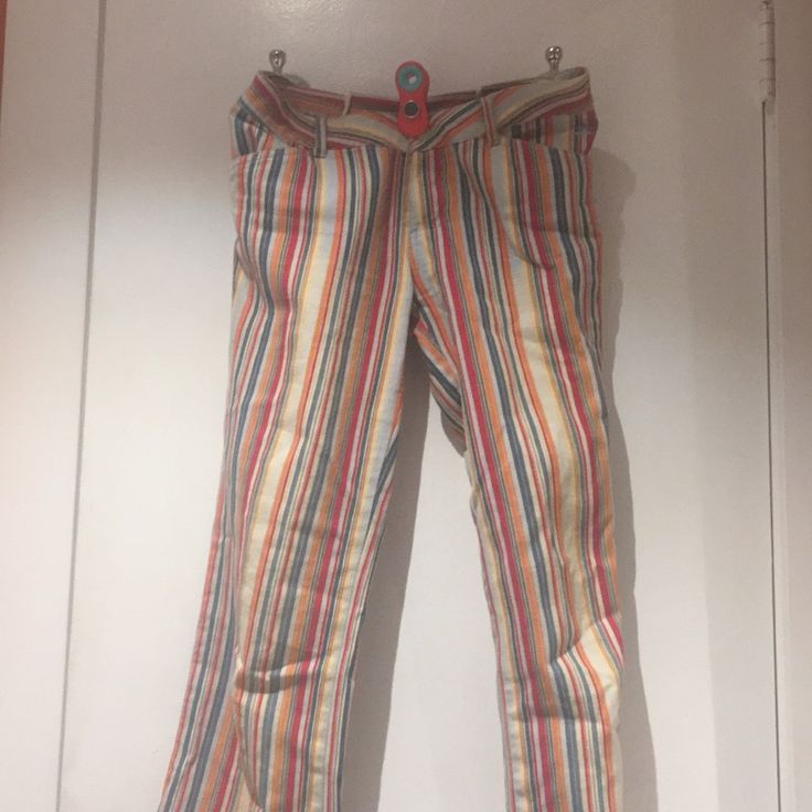 Red, Orange,Dark Blue,Yellow, White, And Light Blue Stripped Billabong Bootleg Pants Size 6 Or 7 Not 10 For The Us Scale.Doesn’t Fit Someone Like Me With Wider Hips And A Bigger Butt! They Are Very Cute And Brighter In Person They Are Definitely A Size Small Trendy Multicolor Straight Leg Pants, Casual High Waist Multicolor Jeans, Casual Mid-rise Multicolor Pants, Trendy Multicolor Mid-rise Bottoms, Multicolor Mid-rise Cotton Bottoms, Casual Stretch Rainbow Bottoms, Multicolor Cotton Mid-rise Bottoms, Casual Multicolor Mid-rise Bottoms, Casual Multicolor Straight Leg Pants