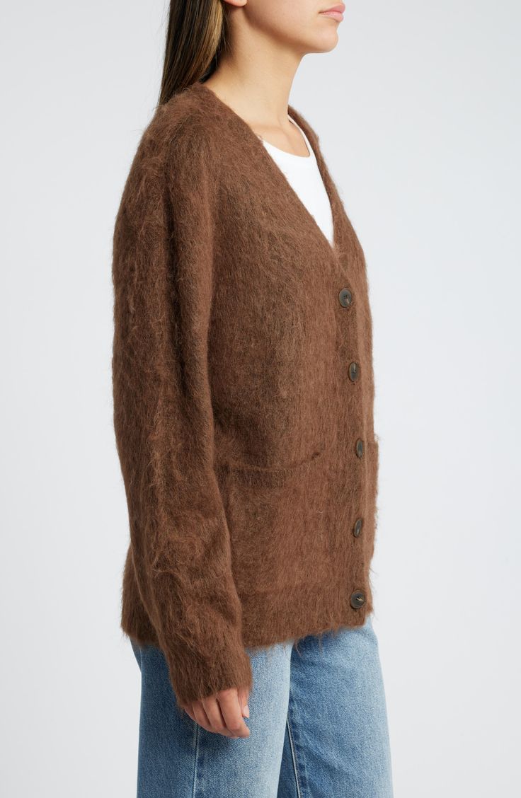 A fuzzy yarn hugs you with comfort in this cardigan knit in a classic, slightly oversized silhouette. Front button closure V-neck Long sleeves Ribbed cuffs and hem Front patch pockets 54% nylon, 24% polyester, 16% acrylic, 6% wool Hand wash, dry flat Imported Casual Mohair V-neck Outerwear, Casual Mohair Outerwear With V-neck, Fall Mohair V-neck Outerwear, Mohair V-neck Outerwear For Fall, V-neck Mohair Outerwear For Fall, Casual Mohair V-neck Cardigan, Casual Mohair Sweater Coat For Fall, Fall Mohair Soft Knit Cardigan, Soft Knit Mohair Cardigan For Fall