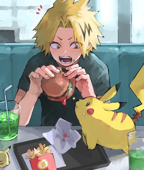 a person sitting at a table with some drinks and pokemon figurines on it