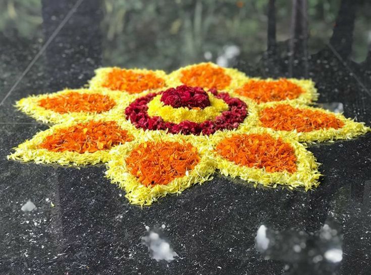 an image of a flower arrangement on the ground