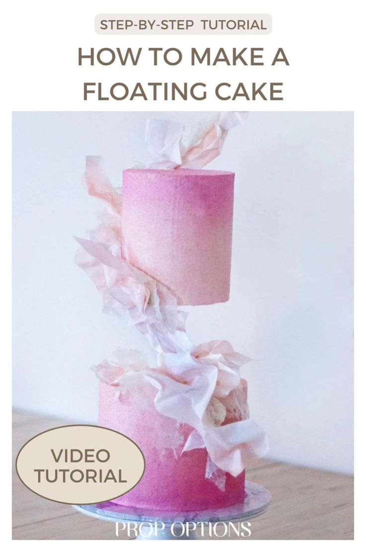 a pink cake sitting on top of a table with the words how to make a floating cake