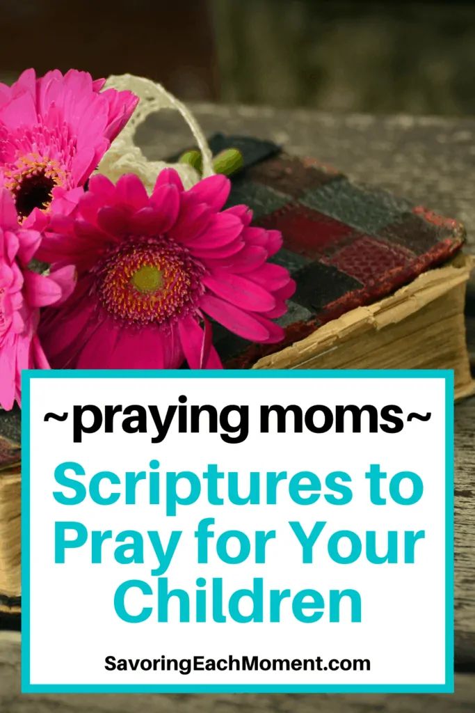 pink flowers sitting on top of an open book with text saying praying moms scripturess to pray for your children