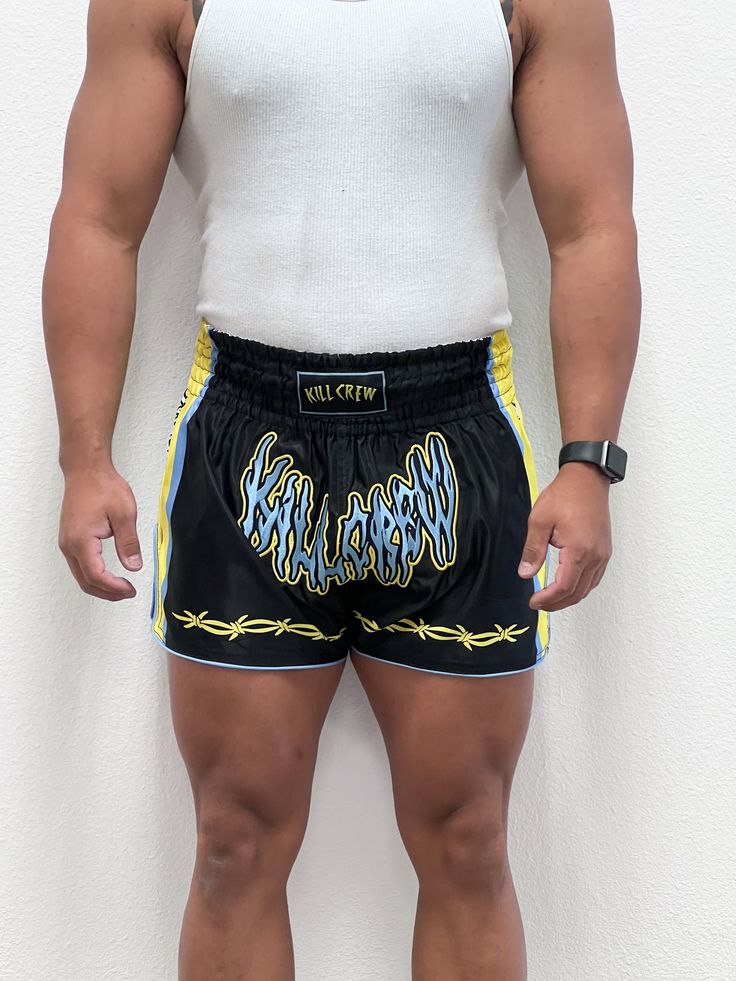 Retro Muay Thai Shorts Hand crafted out of a polyester satin with mesh side panels. 3 inch elastic ribbed waist band. The waist can be worn normally or flipped over the laces traditional Muay Thai style. Waist (inches): XS(26") S(28") M(30") L(32") XL(34") 2XL(36") 3XL(38") 4XL(40") Inseam (inches): S(3.5") M(4") L(4.5") XL(5") 2XL(5.5") 3XL(6) 4XL(6.5) Female model is wearing size small normally wears a size 2 and is 5’7 125 pounds Male model is wearing a size large is 5’8 190 pounds Kill Crew, Black Watermelon, 125 Pounds, Thai Style, M 4, Female Model, Polyester Satin, Muay Thai, Side Panels