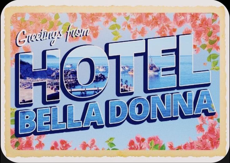 a sign that says hotel bella donna in front of the ocean with pink flowers