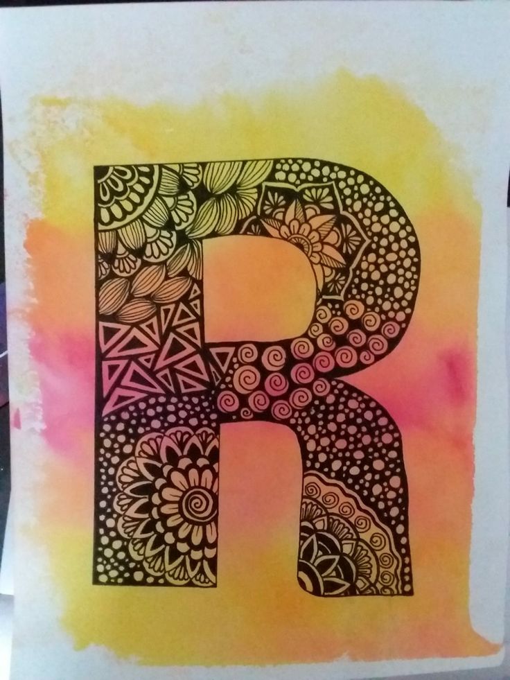 the letter r is made up of flowers and leaves in black ink on watercolor paper