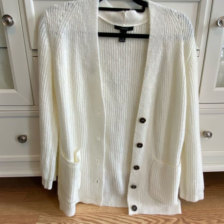 Size Small New Without Tags Super Soft Has Pockets Open To Offers! Trendy White Cardigan With Buttons, Trendy White Sweater With Button Closure, Trendy White Button-up Cardigan, White Casual Cardigan With Buttons, White Knit Button-up Sweater, White Button-up Knit Sweater, White Buttoned Cardigan For Everyday, White Sweater With Buttons For Day Out, White Button Sweater For Day Out