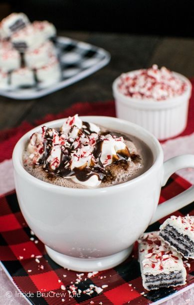 a cup of hot chocolate with marshmallows and whipped cream