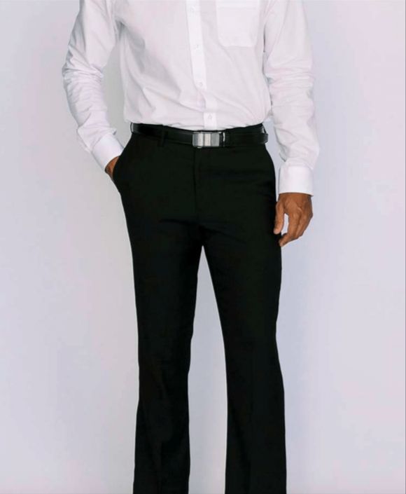 Black flat front dress slacks. The model is also wearing a white dress shirt with a black belt. Classic Closet, Fitted Dress Pants, Fit Dress, Sleek Fashion, After Dark, Modern Fit, Dress Pants, The Modern, Latest Trends