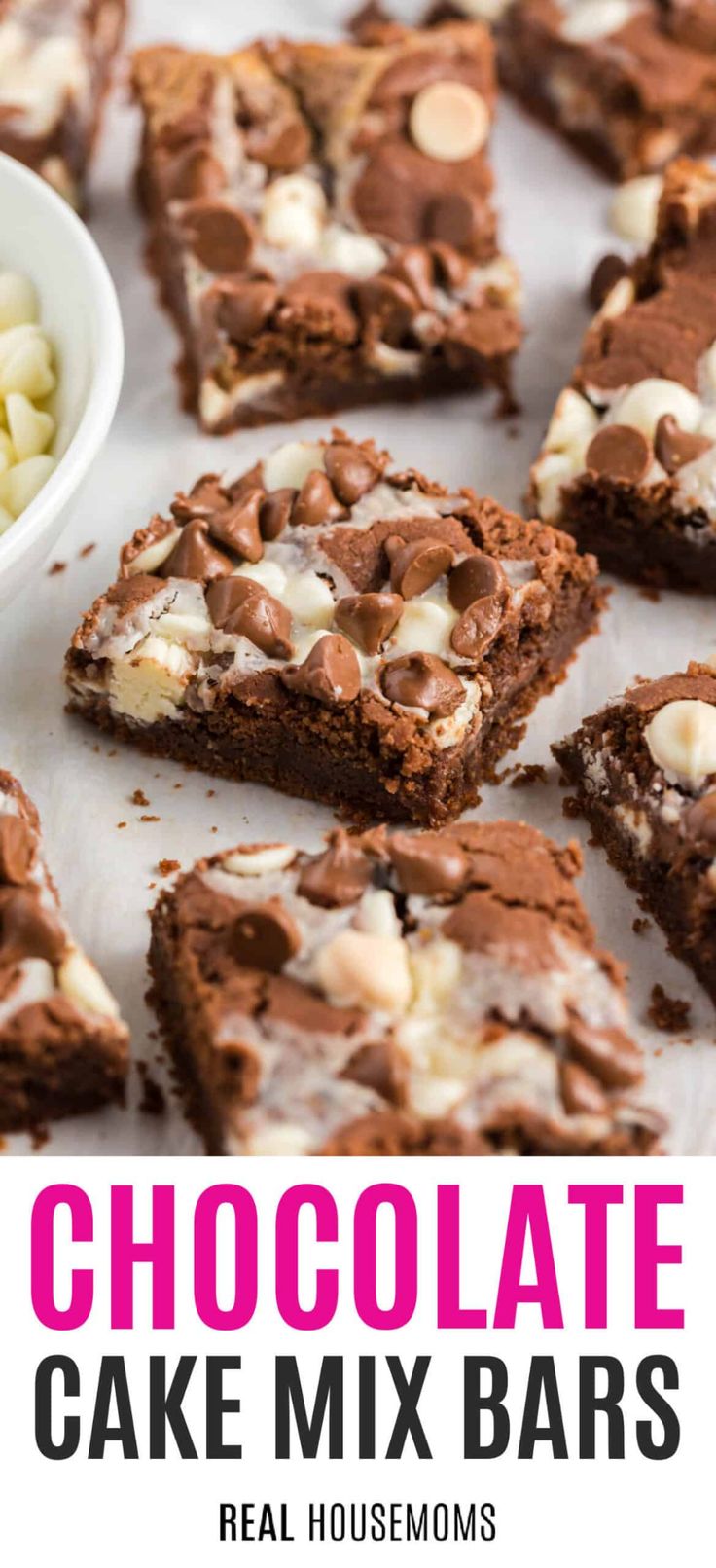 chocolate cake mix bars with white chocolate chips and marshmallows in the middle