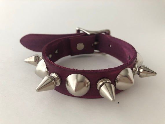 Studded leather punk bracelet with alternating 1/2" spikes and cone studs. Spikes screw in place and aren't that sharp. All hardware is nickel plated.Made with hand dyed vegetable tan leather.Ask me about custom sizes and colors! Spike Bracelet, Studded Leather, Piercing Jewelry, Tan Leather, Hand Dyeing, Fashion Inspo Outfits, Cuff Bracelets, Screw, Piercings