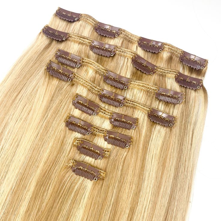 HAIR SPECIFICATIONS: Our TK Clip-Ins are Remy Cuticle hair extensions. There are 8 pieces in each full set of Clip-Ins. (2) 4- clips, (2) 3-clips, (2) 2-clips, (2) 1-clips Our TK Clip-Ins come in 14", 18", and 20". The weight of hair in each length: 14"- 95 grams 18"- 120 grams 20"- 140 grams RECOMMENDATIONS: Our TK Clip-Ins are perfect for those that want to add volume or some length to their hair. Wether they have an event, or just want to wear it out for the evening! Since our Clip-Ins are ma Seamless Clip Ins, Clip In Hair Extensions Irresistible Me, Blonde Clip In Hair Extensions, Clip In Hair Extensions Two Botton Pc Clipped Togethee, Hair Extension Clips, European Hair, Remy Human Hair Extensions, Clip In Hair, Sulfate Free Shampoo