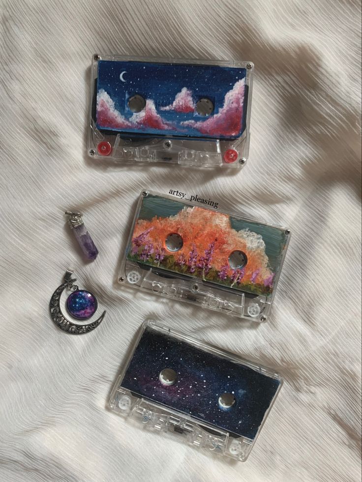 Cassette art upcycling art cloud painting galaxy art flatlays cdart Painting Cassette Tapes Aesthetic, Music Themed Wall Art, Cassette Display Ideas, Cassette Tapes Crafts, Cassette Tape Art Diy, Cassette Painting Ideas, Cassette Tape Painting, Cassette Crafts, Painted Cassette Tapes