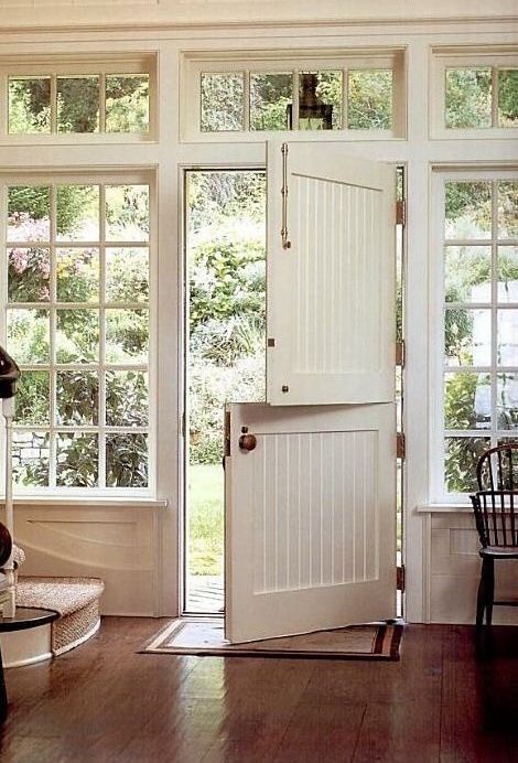 an open door leading into a room with wooden floors