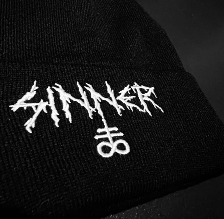 Introducing the ultimate accessory for any alternative look: our high-quality unisex black acrylic beanie with intricate embroidery design. Crafted with attention to detail. Made from premium materials. The detailed embroidery design is sure to turn heads and make a statement wherever you go. Don't settle for ordinary bland clothing brands - choose Forbidden Alchemy for all your black clothing and accessories needs, be unique, express your true self stand out from the crowd. Black Embroidered Beanie Cap, Black Embroidered Beanie One Size, Black Embroidered Beanie, One Size Fits Most, Black Embroidered Beanie For Winter, Adjustable Black Beanie For Streetwear, Unisex Black Beanie Hat, Black Embroidered Beanie Hat, Black Embroidered Beanie, Winter Streetwear Hat With Embroidery