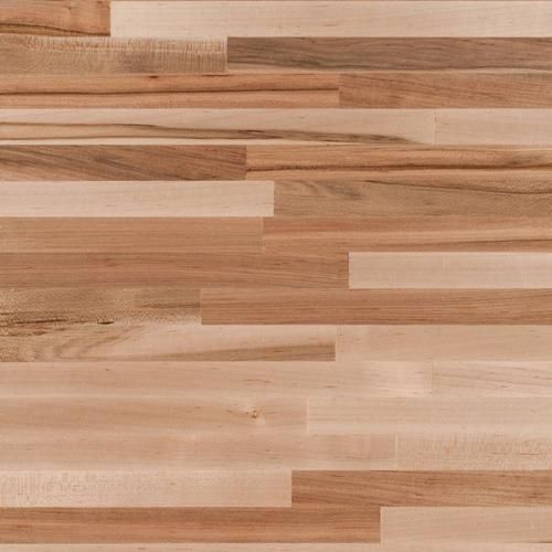 a close up view of wood flooring with different patterns and colors on it's surface