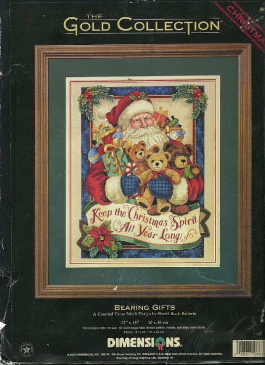 a cross stitch christmas card with santa claus and his teddy bears in it's frame