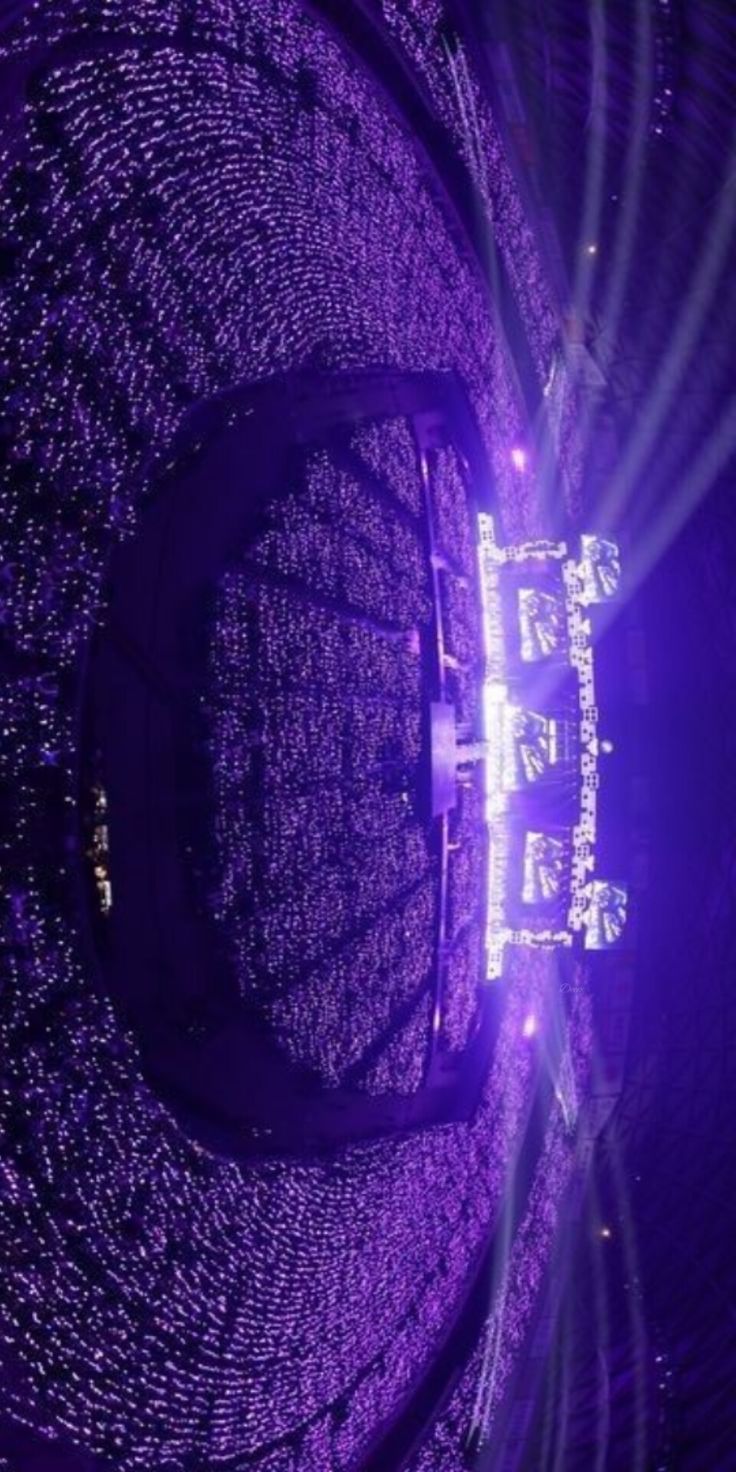 the inside of a large purple object with bright lights