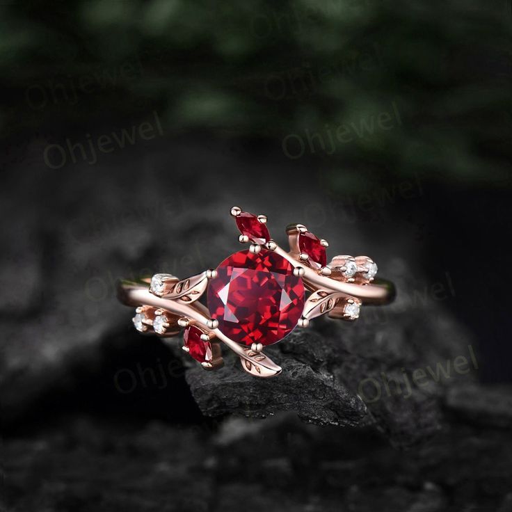 "This is a round 6.5mm  1ct lab red ruby engagement ring in solid gold,  The accent stones are lab red ruby and diamonds or moissanites. The band width is about 1.3mm. It can be made in any ring size. However please contact me to custom make it to a special big or small size. It can be made in white gold,rose gold or yellow gold with 14k or 18k. However for some people who are nickel allergic,I can also make it to 925 sterling silver to make you can wear it. The ring is handmade,very high quality! 30 days money back guarantee. Returns & Warranty 30-Day money back guarantee (starting from the day of delivery). \"Made to Order\" purchases qualify for our 30-day money back guarantee. The 30-day money back guarantee gives you time to make sure your purchase is perfect. If you need to  return i Red Engagement Ring, Red Diamond Ring, Garnet Ring Vintage, Ruby Wedding Rings, Rose Gold Leaf, Garnet Engagement Ring, Red Garnet Ring, Natural Ruby Ring, Red Ring