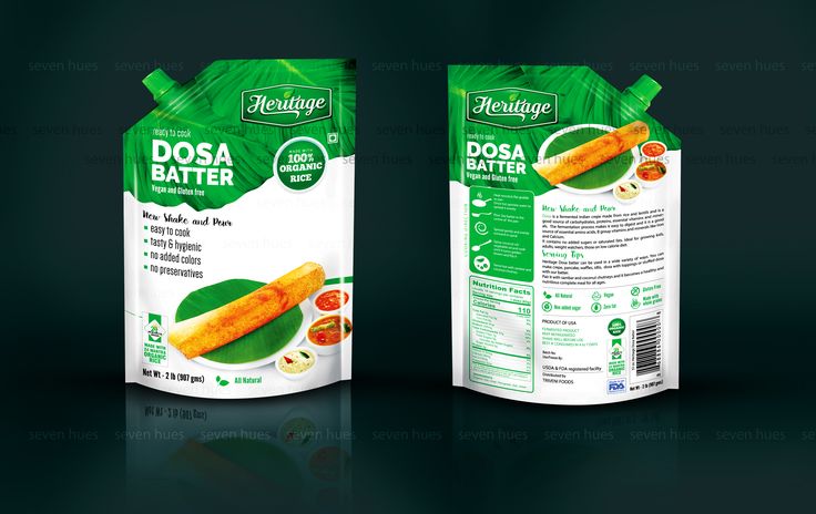 two bags of dosa batter on a dark background, one is green and the other is orange