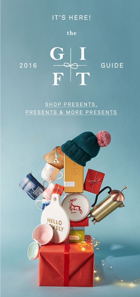 the gift guide is on display in front of a blue background with presents and other items