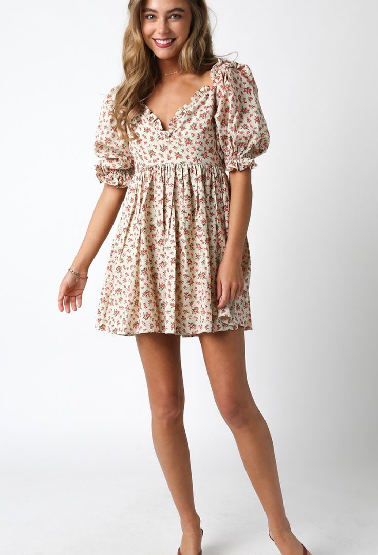 Elevate your style with our 'August Bloom Mini Dress'. This timeless dress features charming puff sleeves and a delicate ruffle hem, adding a touch of femininity to your look. The beautiful floral pattern adds a pop of color, making it the perfect choice for any occasion. Complete your wardrobe with this versatile and stylish mini dress. Content & Care: Self: 100% Linen Lining: 100% Rayon Hand wash cold Feminine Fitted Floral Print Puff Sleeve Dress, Feminine Fitted Puff Sleeve Dress With Floral Print, Spring Brunch Puff Sleeve Dress With Ditsy Floral Print, Puff Sleeve Floral Dress For Brunch, Spring Puff Sleeve Dress With Ditsy Floral Print, Chic Floral Print Puff Sleeve Dress For Garden Party, Flowy Floral Print Puff Sleeve Dress For Garden Party, Chic Floral Puff Sleeve Dress For Garden Party, Flowy Puff Sleeve Floral Dress For Garden Party