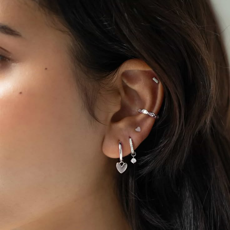 Sterling Silver Marquise crystal eternity ear cuff perfect for your ear stack.| Lead and Nickel free. Sold as a SINGLE earring, purchase 2 for a pair .925 Sterling Silver White Zirconia Gemstone Width 2.5mm(0.10in) Inside Diameter 9mm(0.35in) Adjustable sizing #J595-S Ear Jewelry Ideas Silver, 2 And 3 Ear Piercing, Piercings Silver Ear, Silver Ear Stack Aesthetic, Silver Tarnish-resistant Piercings, Stackable White Gold Huggie Earrings, Silver Dainty Huggie Jewelry, White Gold Stackable Huggie Jewelry, Dainty Silver Huggie Jewelry