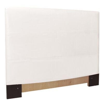 a white headboard with black trim and wooden slats on the bottom part of it