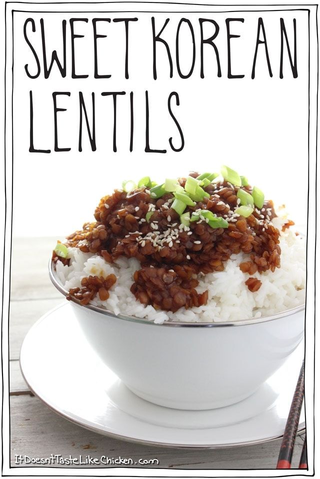 sweet korean lentils in a white bowl on a plate with chopsticks next to it