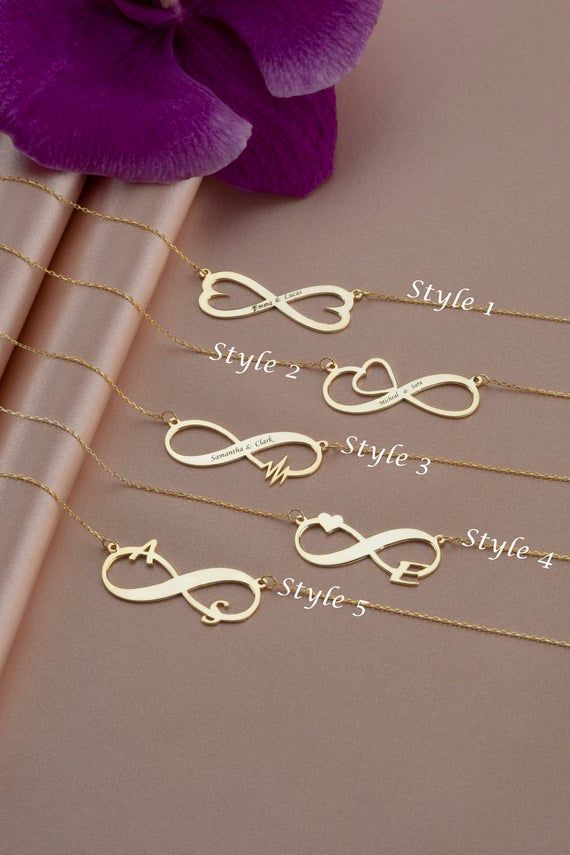 14k Gold Infinity Letter Necklace Collection • Custom Gold Name Necklace • Personalized Valentines Day Gift for Her • Name Letter JewelryOur infinity name necklaces are perfect choice for a Christmas, Mother’s Day, valentine's day, birthday, wedding, anniversary, graduation, engagement, bridesmaid, and best friends gift. It’s a good way to show appreciation to your mom, girlfriend, wife, grandmother, grandchildren, daughter, sister, best friend, boss or a co-worker. Also, a special treat just fo Valentine's Day Infinity Jewelry With Custom Name, Custom Name Infinity Necklace For Valentine's Day, Infinity Necklace For Valentine's Day Personalized Gift, Infinity Necklace For Birthday And Mother's Day, Valentine's Day Infinity Necklace Engraved, Personalized Infinity Necklaces For Anniversary, Personalized Infinity Jewelry For Anniversary, Personalized Infinity Jewelry For Mother's Day, Personalized Infinity Necklace For Anniversary