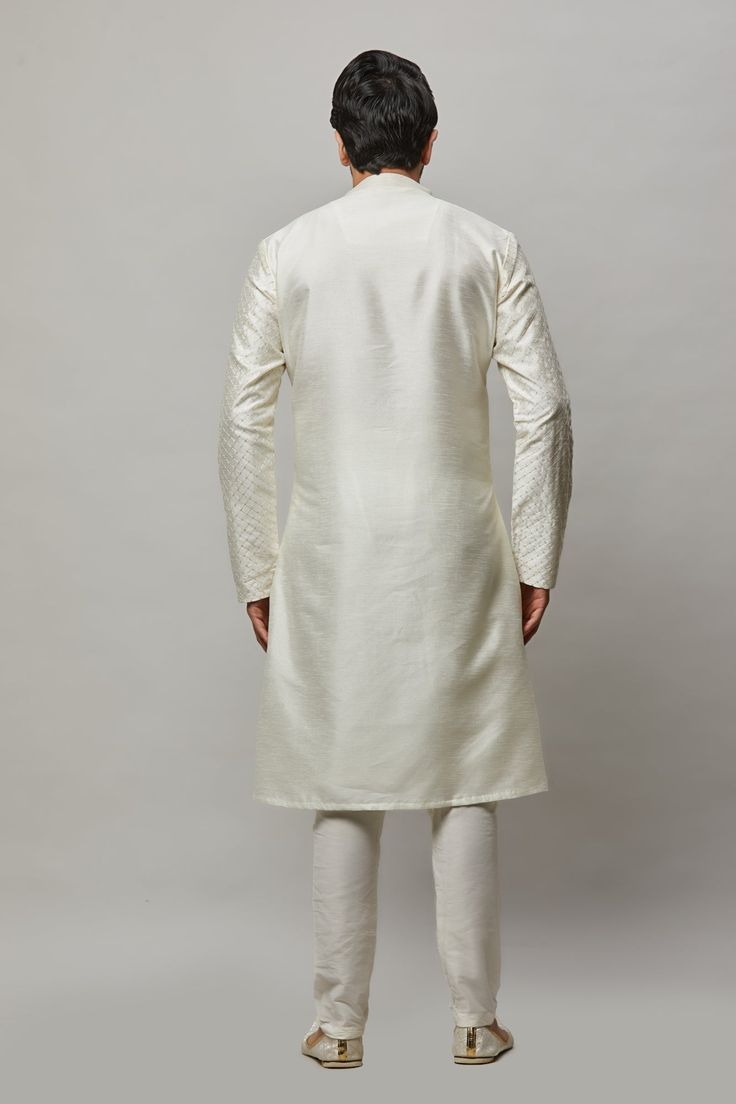 Raw Silk Kurta with thread and gold sequence embroidered in the fabric plus gold churidar Crafted with a collar neckline, full sleeves, and front button closure. Occasion: Can be worn to lighter events like Sangeet, Mehendi, Puja, or a small party WASH CARE INSTRUCTIONS - Please Dry clean only when it is applicable. Slight color variation is possible due to digital photography. Raw Silk Kurta, Mens Kurta Pajama, Blouse Size Chart, Mens Sherwani, Small Party, Mens Kurta, White Kurta, Silk Kurta, Kurta Pajama