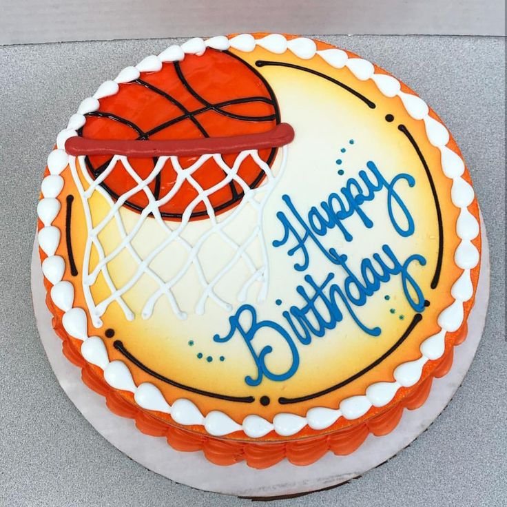 a birthday cake with a basketball and net on the top is for a happy birthday