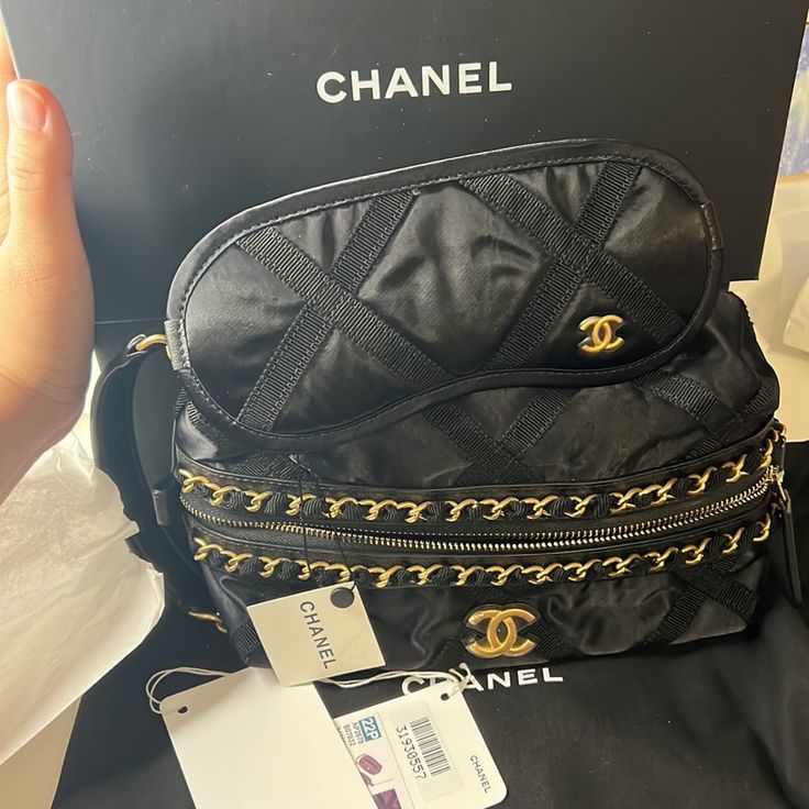 Nwt Never Used. Chanel Nylon Bag And Sleep Mask. Comes With Original Dust Bag, Price Tag And Box. 8” L X 4.5” H X 2.5” D. Luxury Nylon Crossbody Bag, Designer Nylon Bag With Zipper Closure, Luxury Nylon Shoulder Bag With Removable Pouch, Evening Nylon Bag With Removable Pouch, Luxury Nylon Evening Bag, Luxury Evening Nylon Bag, Designer Nylon Shoulder Bag For Evening, Luxury Nylon Bag With Zipper Pocket, Luxury Nylon Shoulder Bag With Zipper Pocket