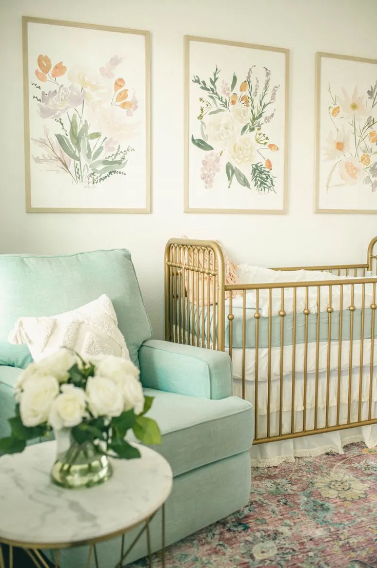 a baby's room is decorated in pastel colors and floral prints, including roses